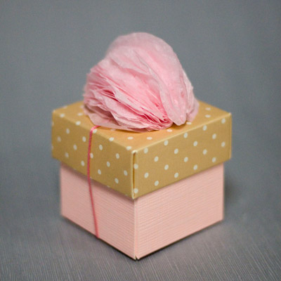 Pom Pom Decoration on a Favor Box