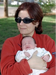 mom and her baby girl photographing babies