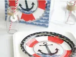 Learn how to DIY charming sailboat place-card holders for your nautical baby shower with this quick, step-by-step tutorial.